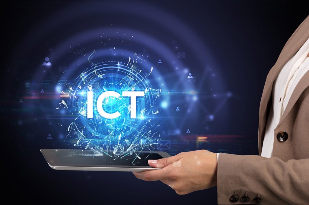 Close-up of a touchscreen with ICT abbreviation, modern technolo